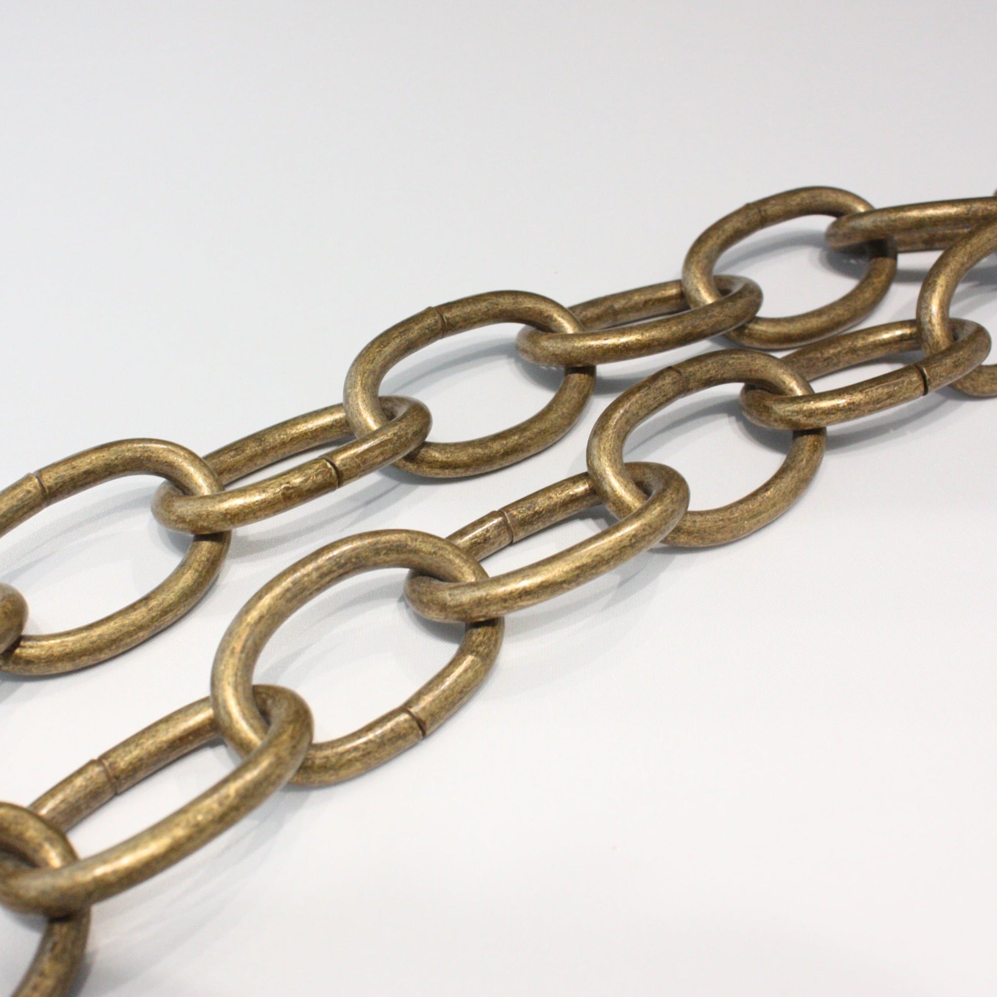 Antique Brass 3.5x2.25mm Small Flat Cable Chain sold by the foot at   Chain0077AB